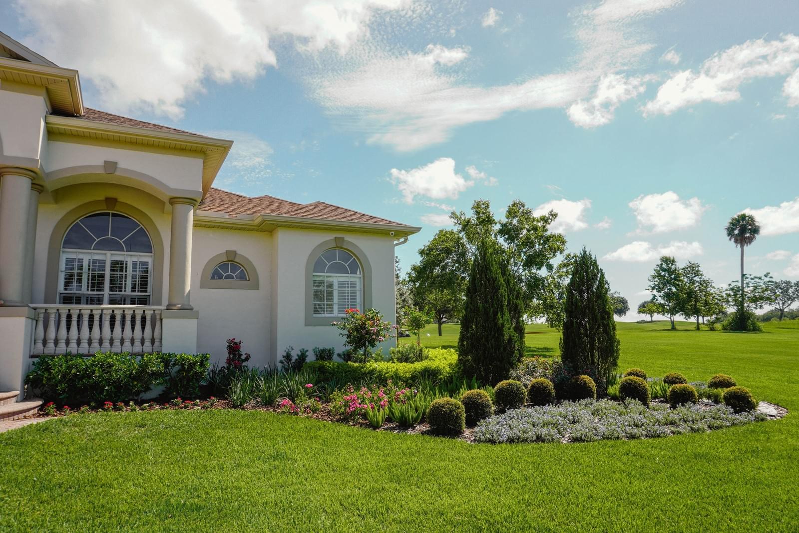 Lake Jovita Estate — before and after landscaping photo 8