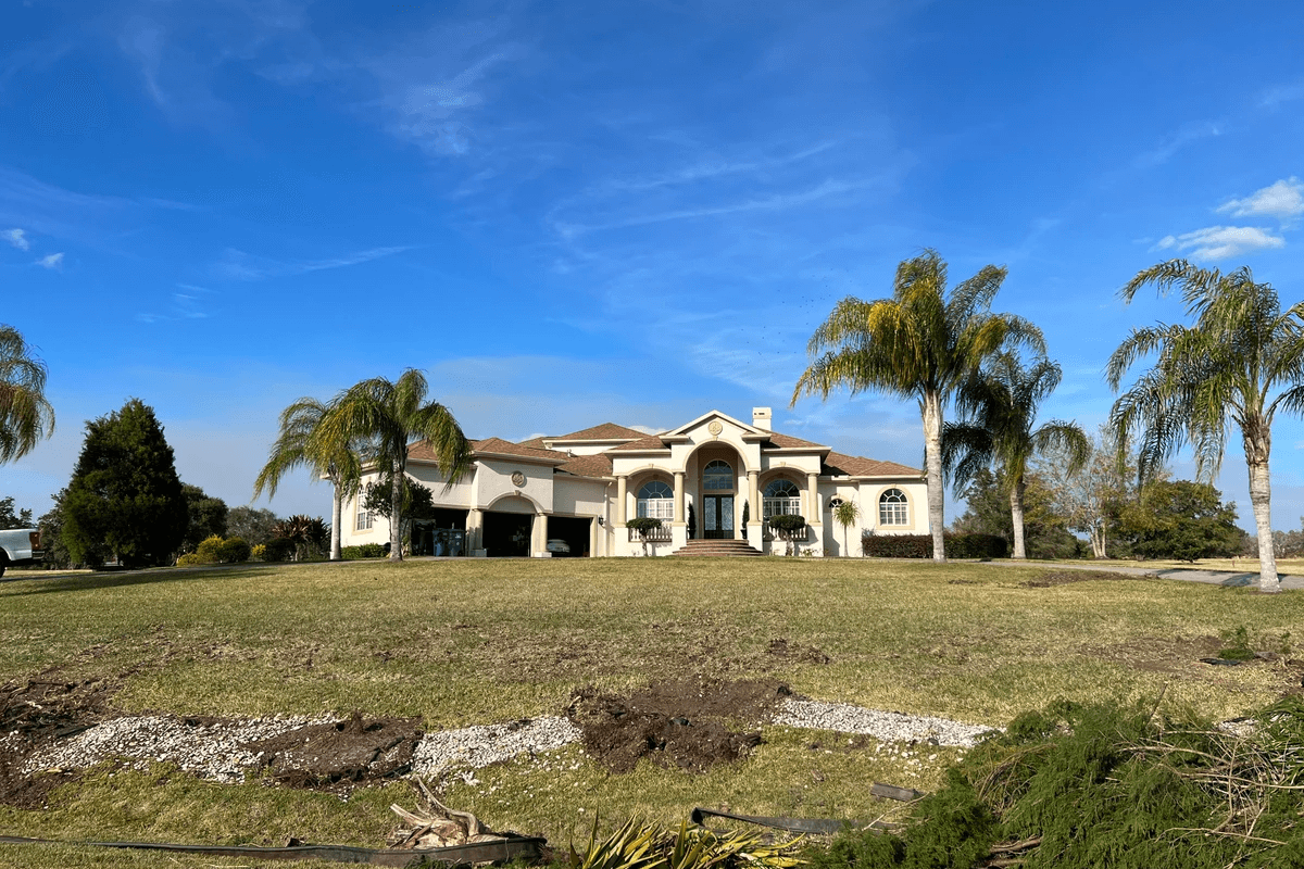 Lake Jovita Estate — before and after landscaping photo 1
